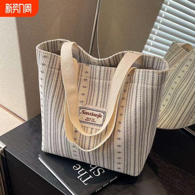 日式包包女2025帆布包条纹手拎单肩包女托特通勤书包手提休闲白色