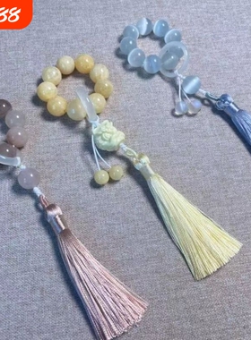新品青白玉手捻女流苏象牙果醒狮绕指柔小串流苏手串一件代发
