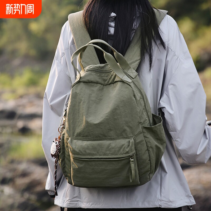 韩国ins帆布书包女旅行背包百搭双肩包女尼龙徒步黑色登山拉杆