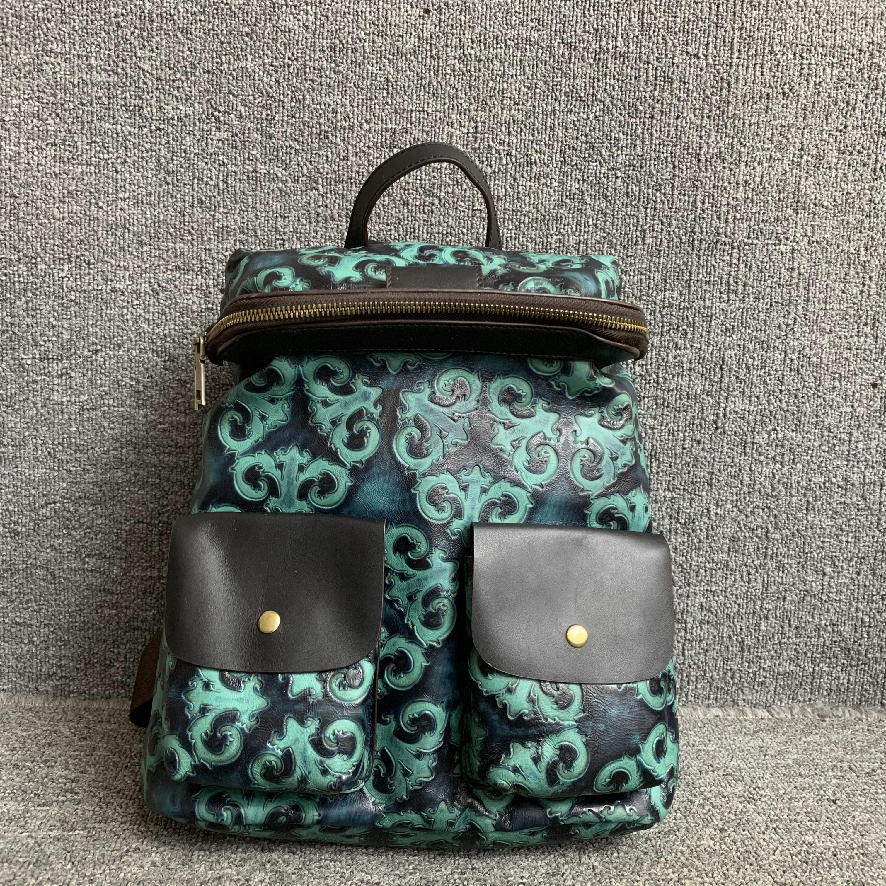 早春新品真皮背包小众复古头层牛皮撞色男女通用大容量双肩背包
