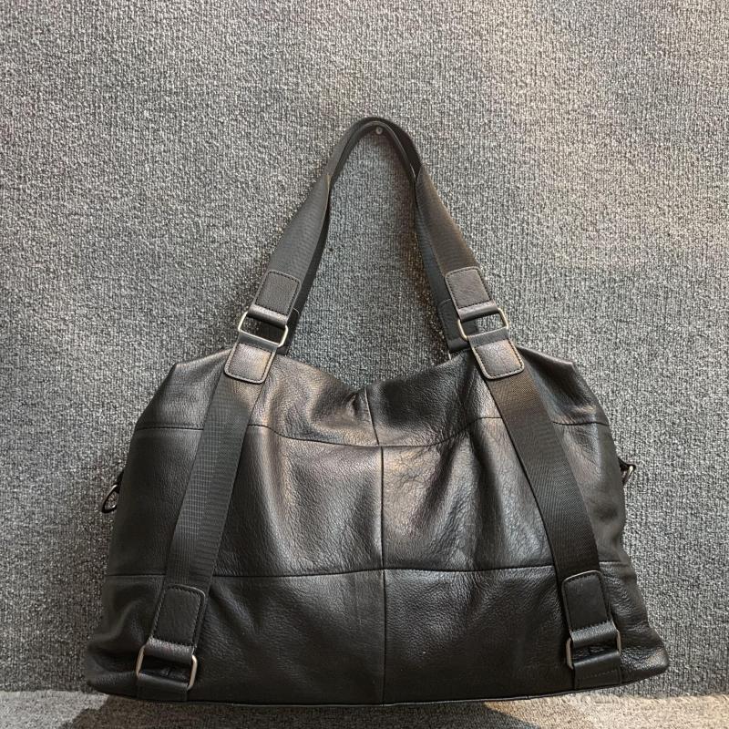 梦嘉丽头层牛皮大容量旅行包通用