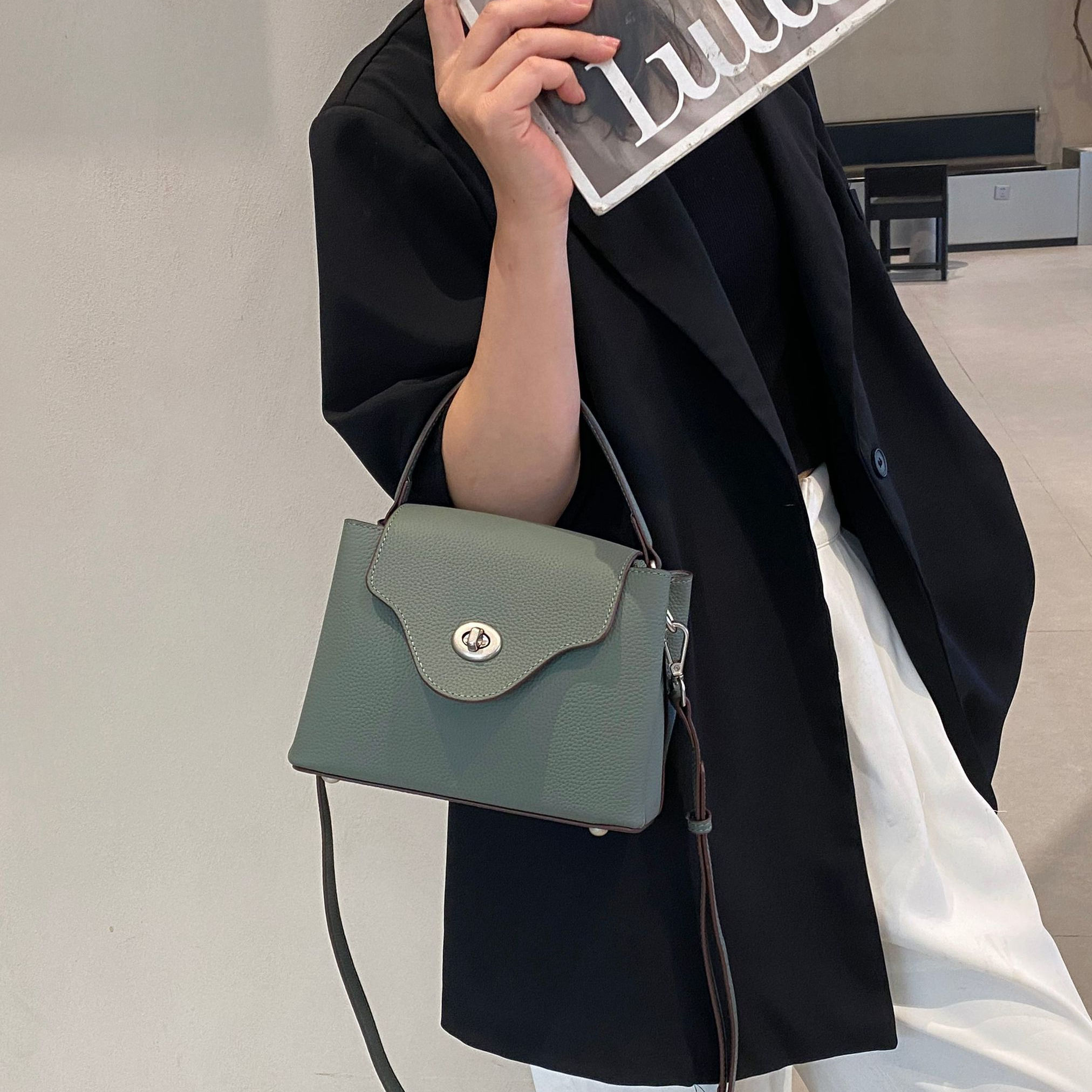 新品小众真皮女包春夏小清新百搭头层togo牛皮女手提单肩多夹层包