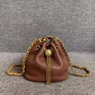 松弛慵懒风~~甜美淑女真皮女包头层牛皮女手提单肩链条抽带水桶包