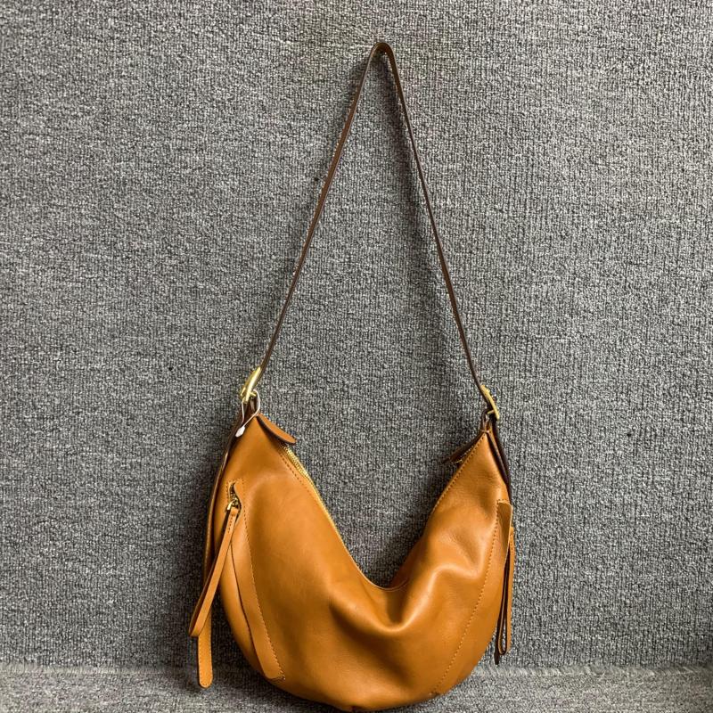真皮女包小众设计新品头层树膏植鞣牛皮女单肩斜跨复古简约饺子包