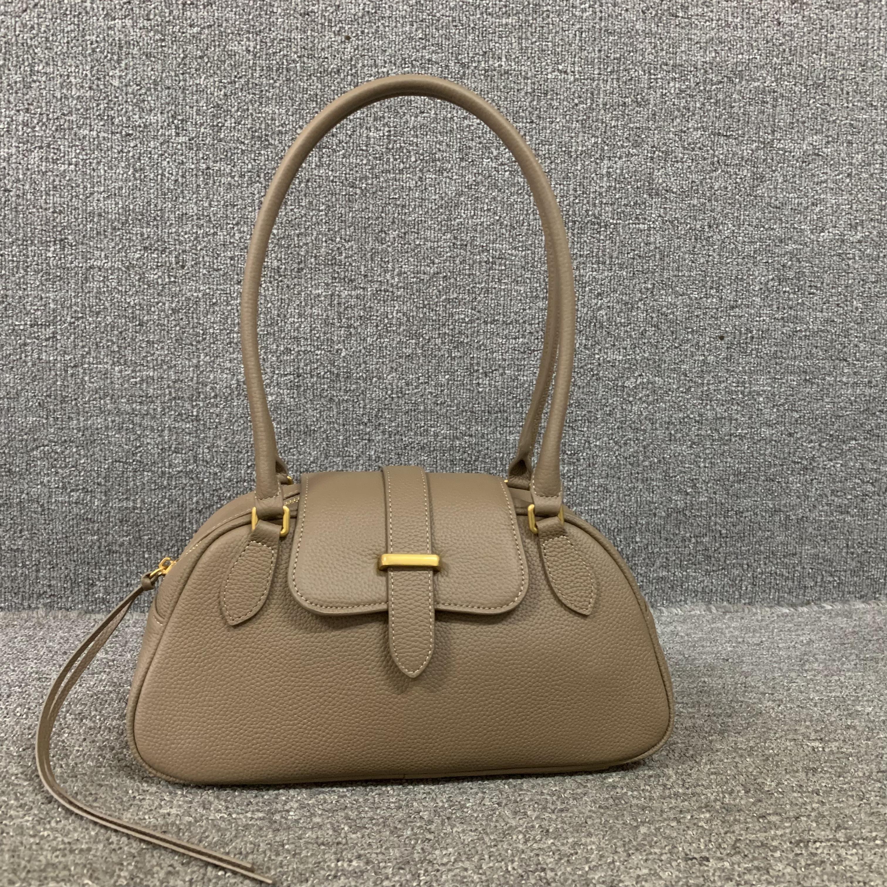 头层牛皮单肩腋下法棍包女包