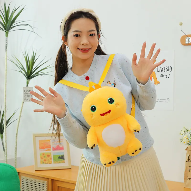 新款可爱卡通呆萌黄色奶龙霸王龙毛绒双肩包生日礼物玩偶包公仔