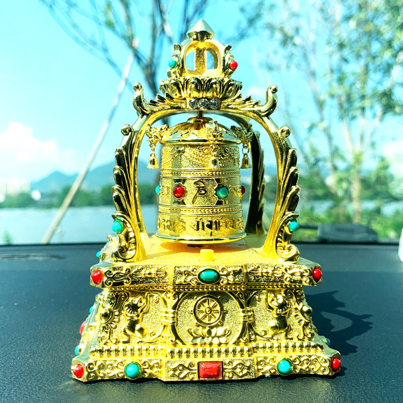 车载太阳能转经筒车内摆件西藏桶转经轮汽车内饰品摆件男香水摆件