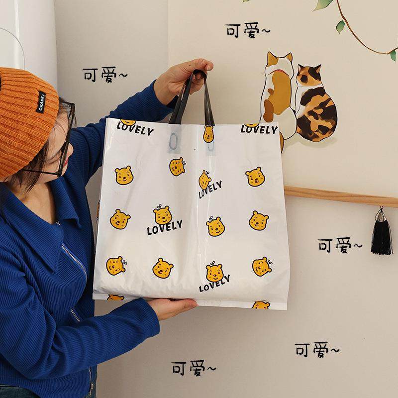 新款直销网红服装手提袋双面卡通印花商场礼品袋子服装店塑料手提