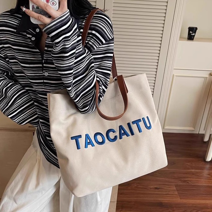 时尚字母刺绣帆布包包女大容量轻便百搭单肩包上课通勤手提托特包