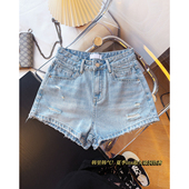 毛边显瘦显高学生热裤 女夏时尚 浅蓝色高腰破洞牛仔短裤 小众设计