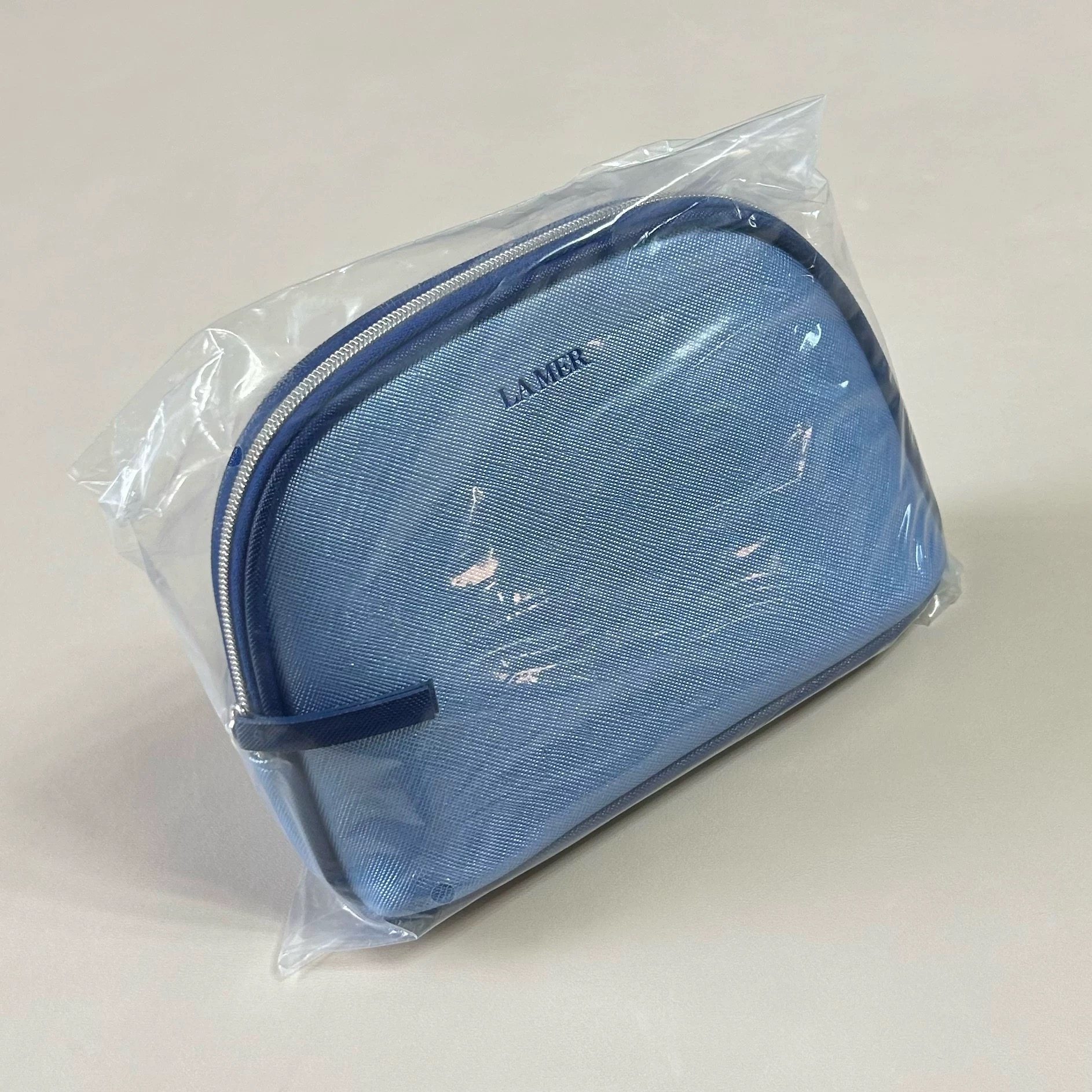 海蓝之谜赠品深蓝色pu贝壳型时尚便携简约化妆包手拿包收纳包,收纳整理,化妆包,淘宝优惠券,粉丝福利购,淘宝优惠卷