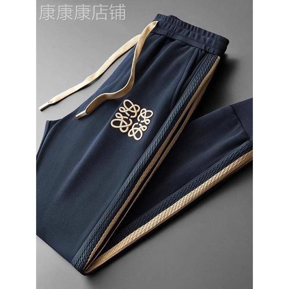 MK休闲裤男2025新款春秋高端拼接织带刺绣男士宽松束脚运动卫裤