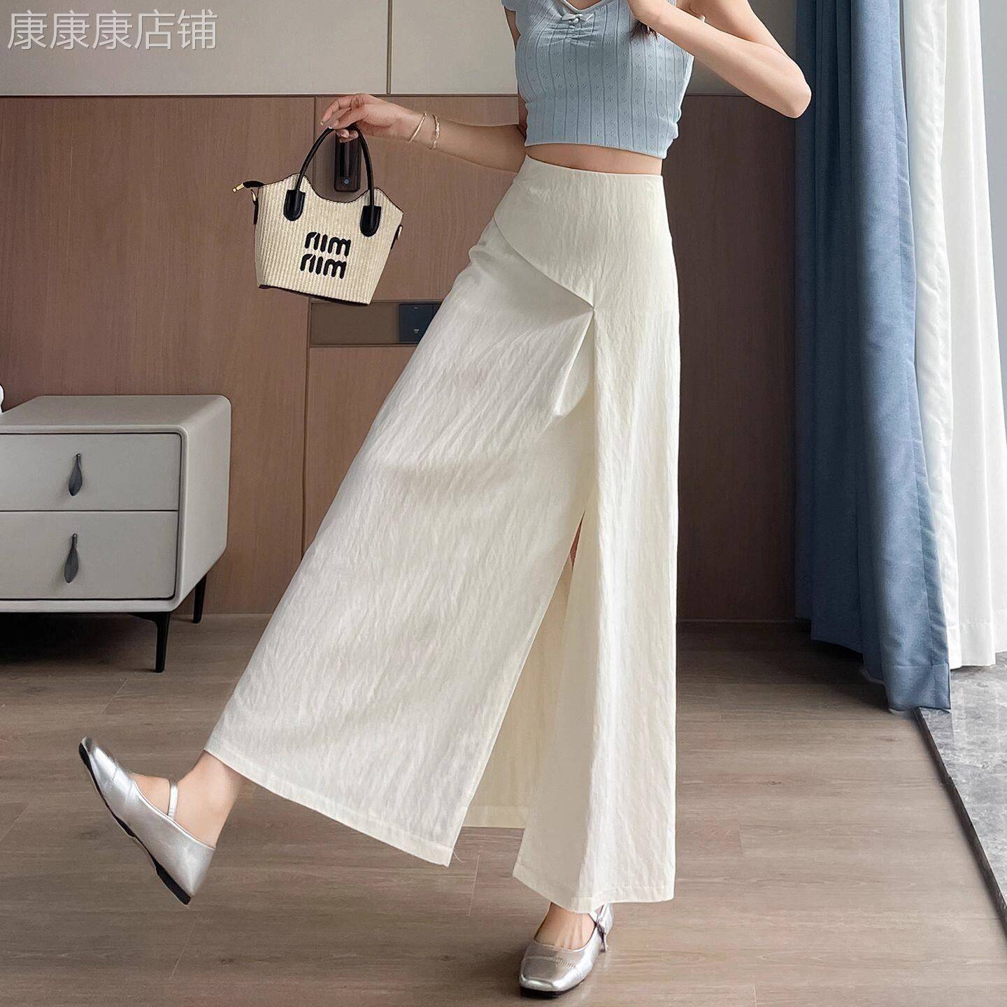 高腰开叉半身裙女夏季2026新款不规则天丝棉麻垂感时尚遮胯长裙子