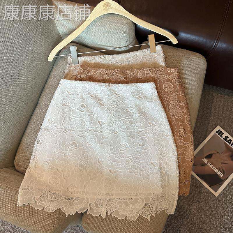 白色蕾丝高腰半身裙女士2026夏季新款不规则下摆遮胯显瘦A字短裙
