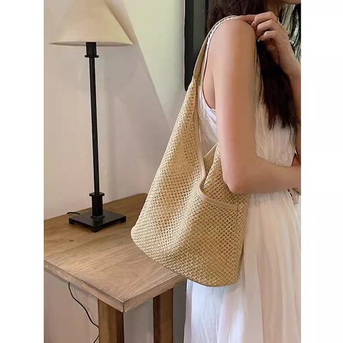 法式草编包女文艺森系上班用的包包2026新款夏天小清新编织水桶包