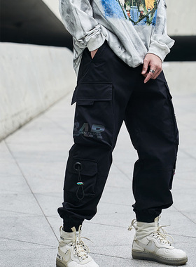 泰王男装丨工装裤男2025春季新款休闲裤印花幻彩伞兵机能风长裤