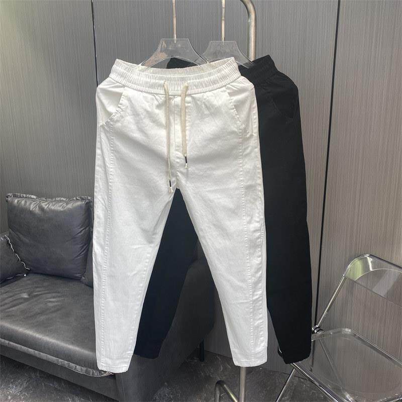 白色牛仔裤男秋冬加绒加厚哈伦裤小脚休闲高级感百搭九分束脚裤子