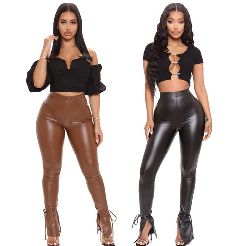 New women's tight strap PU leather pants with flared sides,