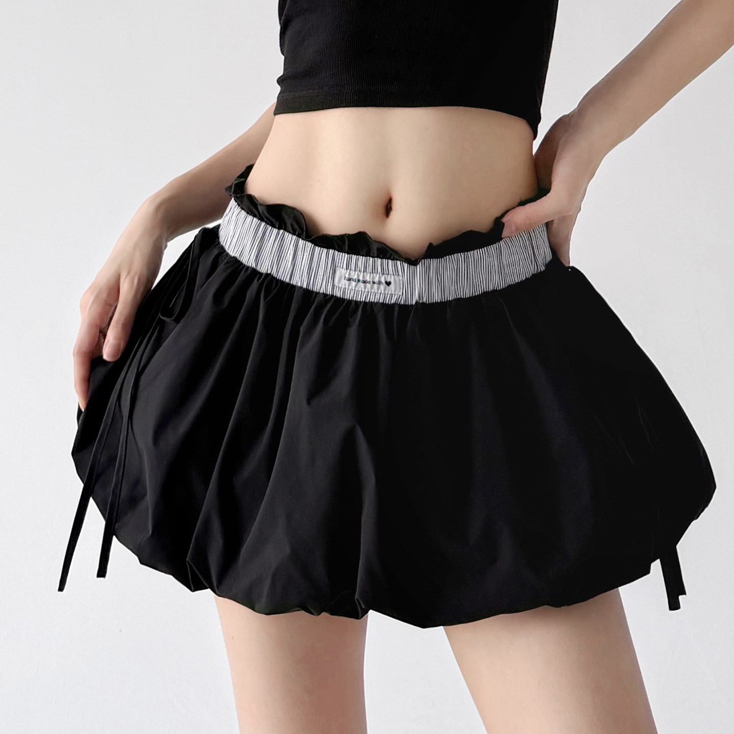 木昱子黑色运动短裤女2026夏装新款花苞半身裙女款短裙绑带A字裙图片