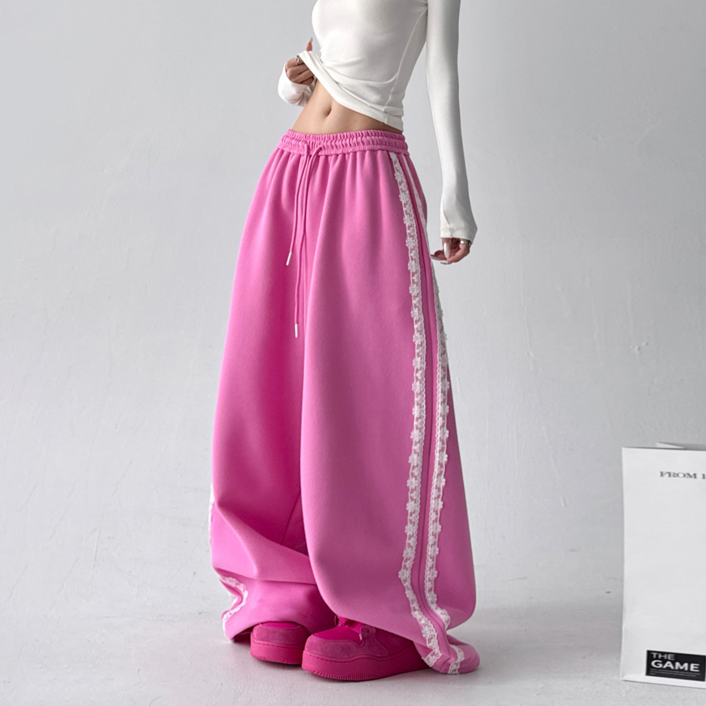 韩系穿搭2025秋冬季新款卫裤女百搭蕾丝花边拼接口袋直筒休闲裤