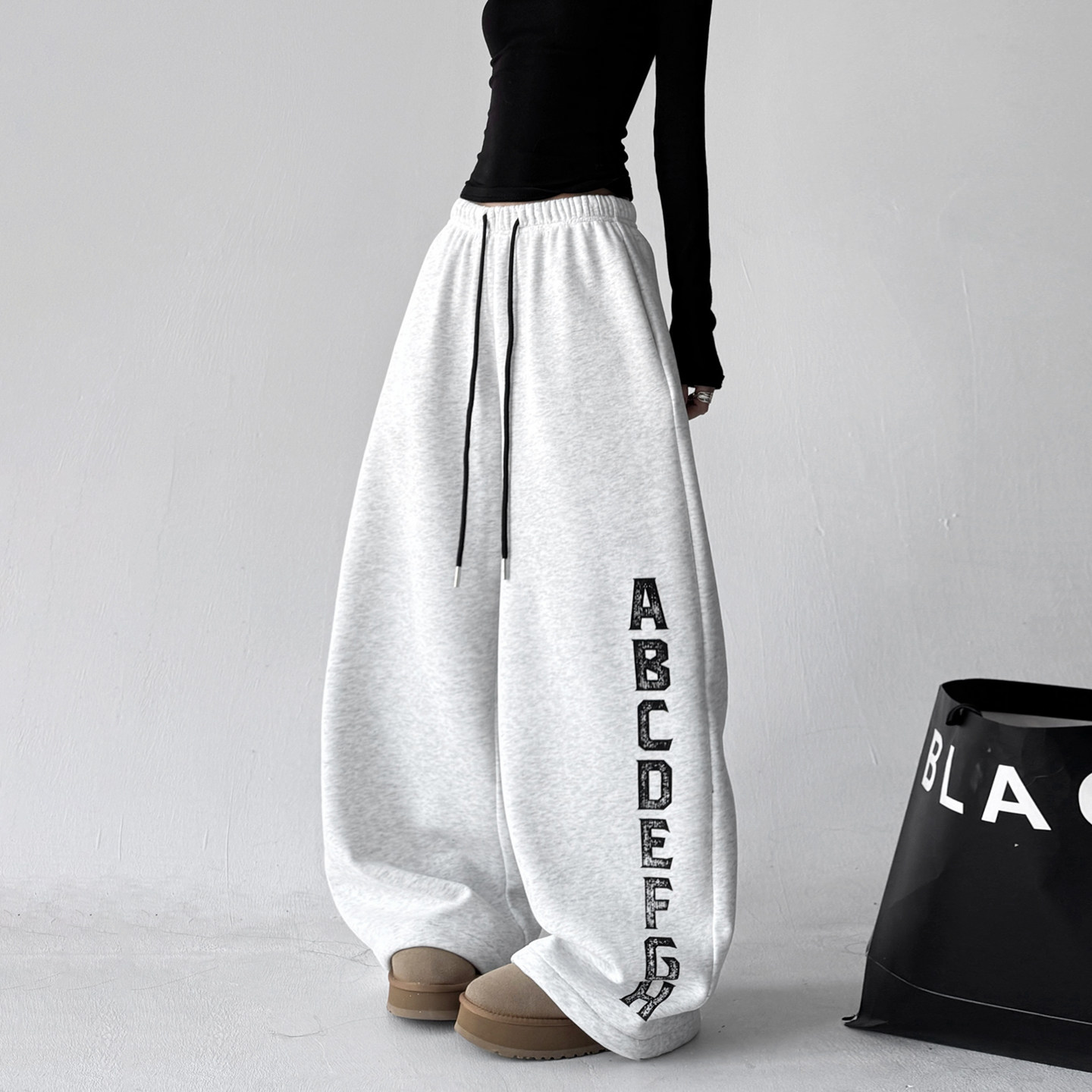 超火冬装新款卫裤女2026冬阔腿裤加绒加厚爵士舞白色运动别致卫裤