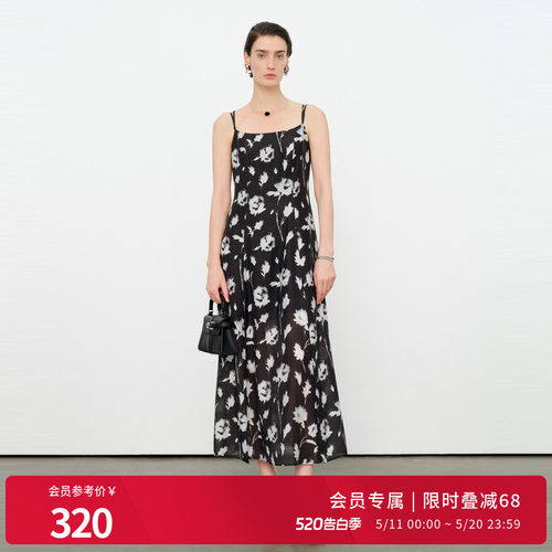 黑白花吊带连衣裙