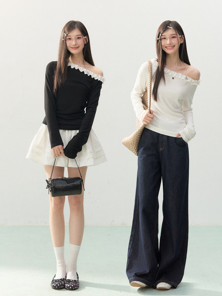 Two models wearing off-shoulder tops styled with a skirt and wide-leg jeans.