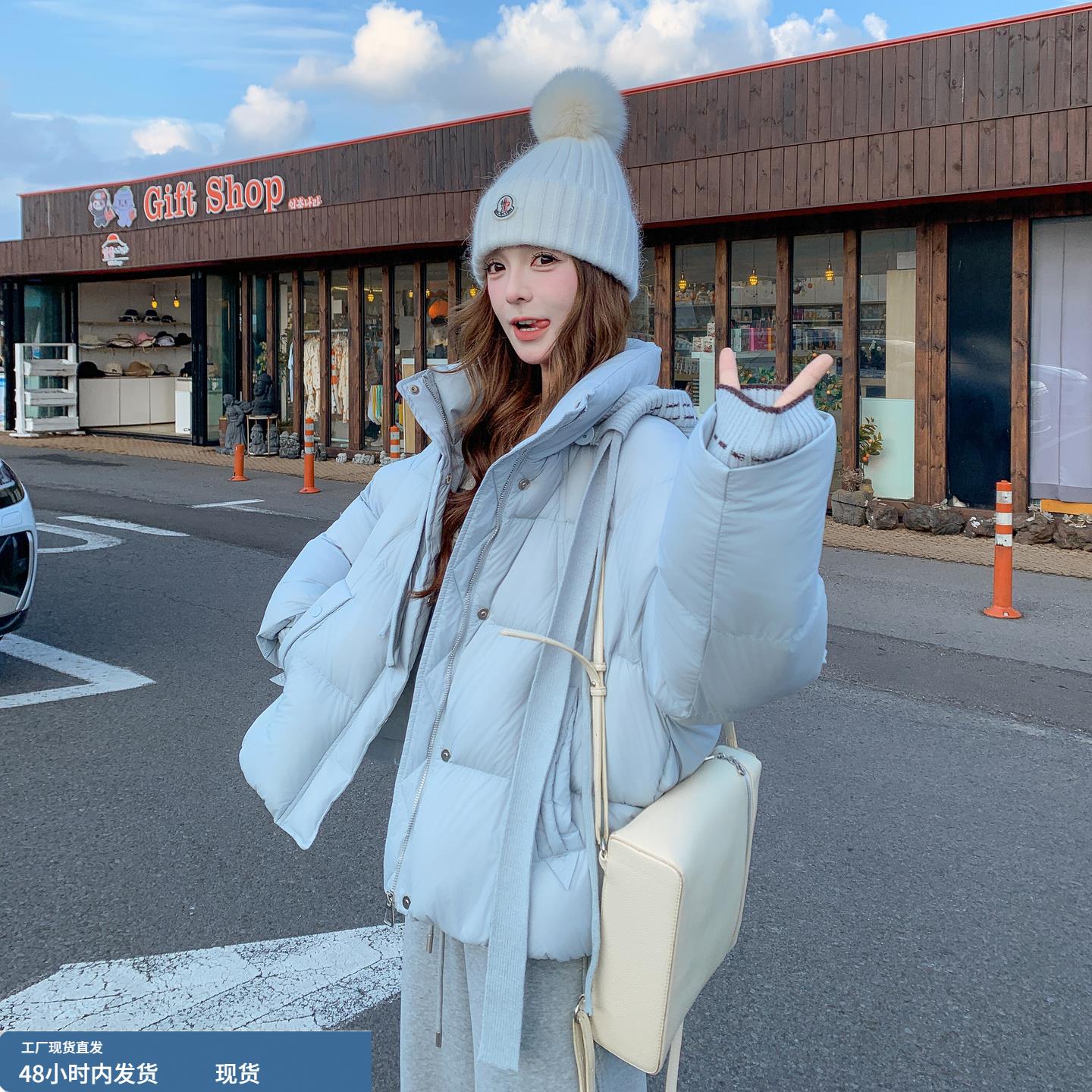 蓝色今年流行的松弛感针织连帽羽绒服女冬季2025新款90绒保暖外套