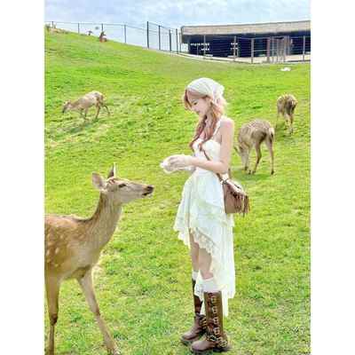 新疆草原大西北川西旅游穿搭女装甜辣风前短后长不规则吊带连衣裙