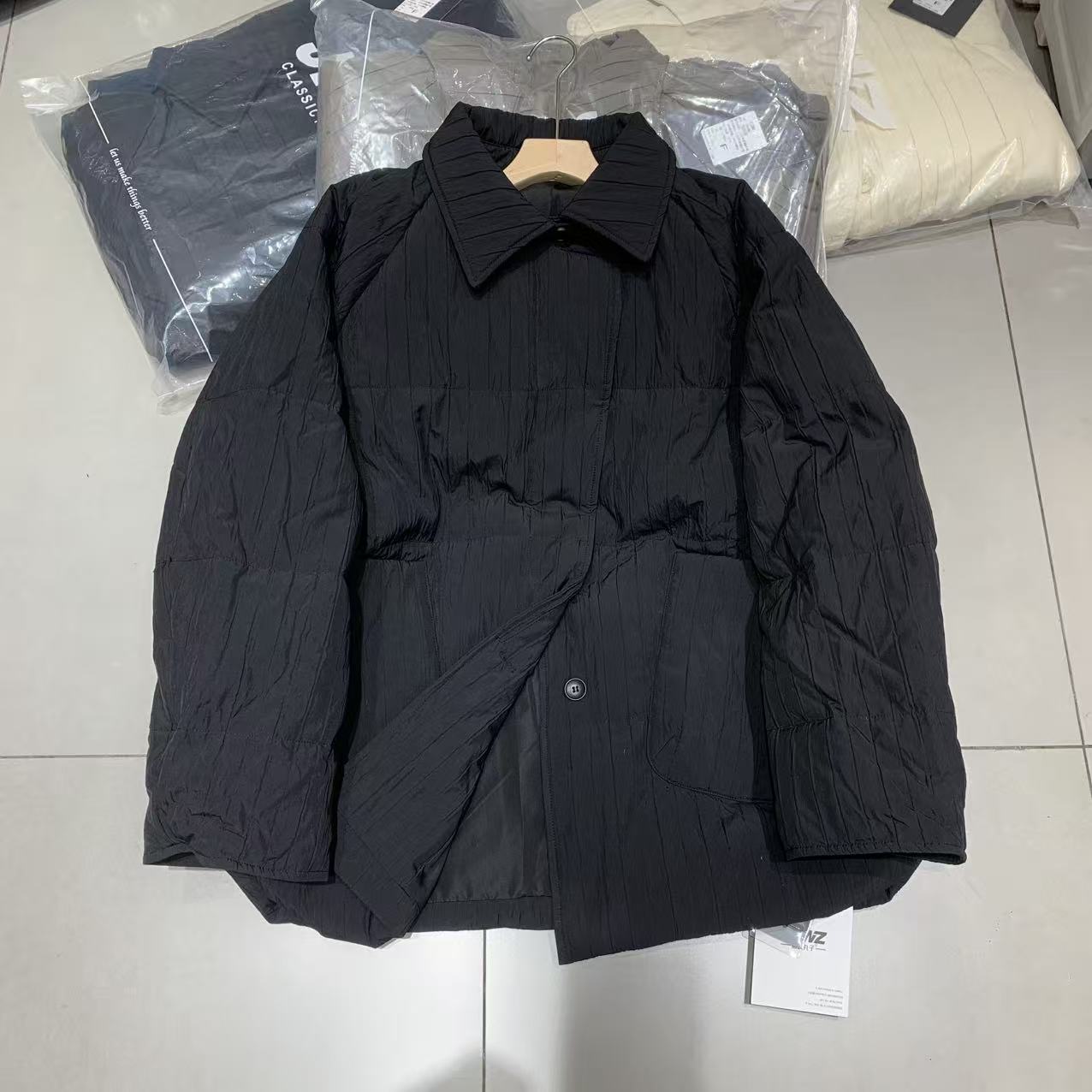 欧洲站2025冬季新款正品女装潮流翻领长袖羽绒服外套中长款上衣