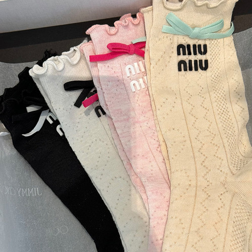 蝴蝶结木耳边镂空甜美