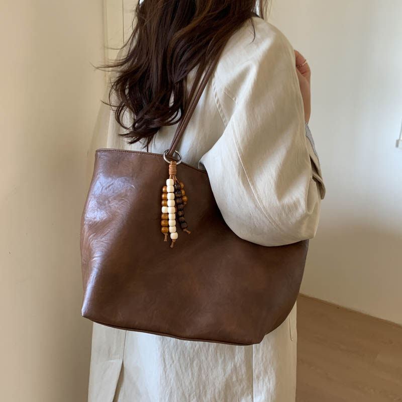 高级感复古通勤大容量托特秋冬包包女2025新款超火大学生上课单肩