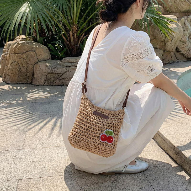夏天时尚编织镂空海边度假风旅游沙滩斜挎包女2026新款超火单肩包