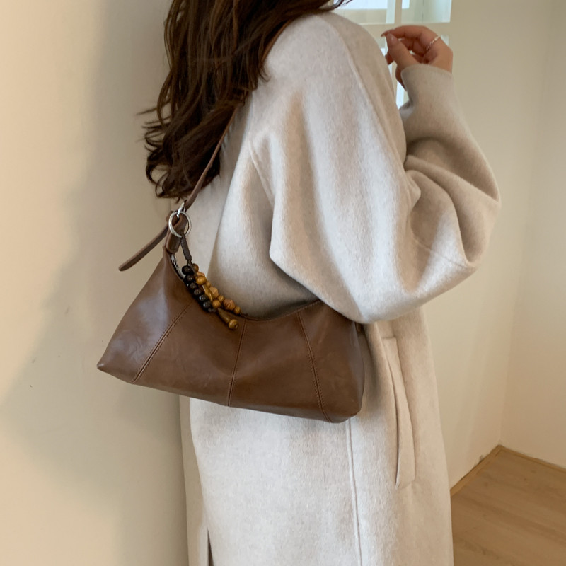 轻奢小众高级感复古单肩包女2025新款秋冬时尚腋下斜挎通勤托特包