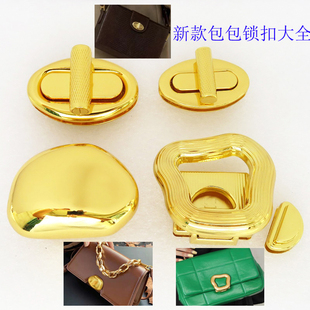 新款女包活页拧锁K金色条纹环椭圆旋转锁扣子五金配件石头形翻盖