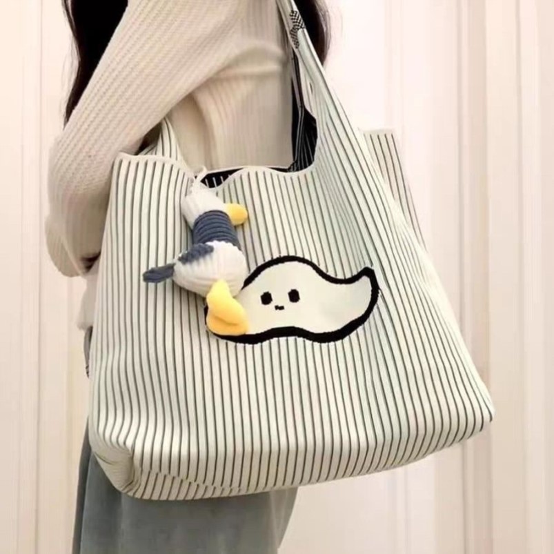可爱云朵针织条纹帆布手提包包女