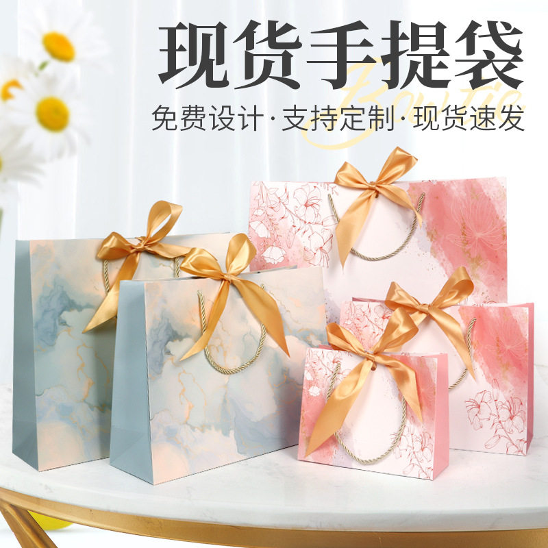 手提袋时尚蝴蝶结纸袋印刷服装袋礼品袋购物袋丝带包装袋化妆品袋