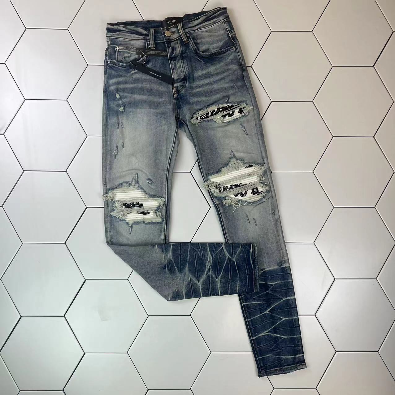 水洗做旧白拼布高街牛仔裤