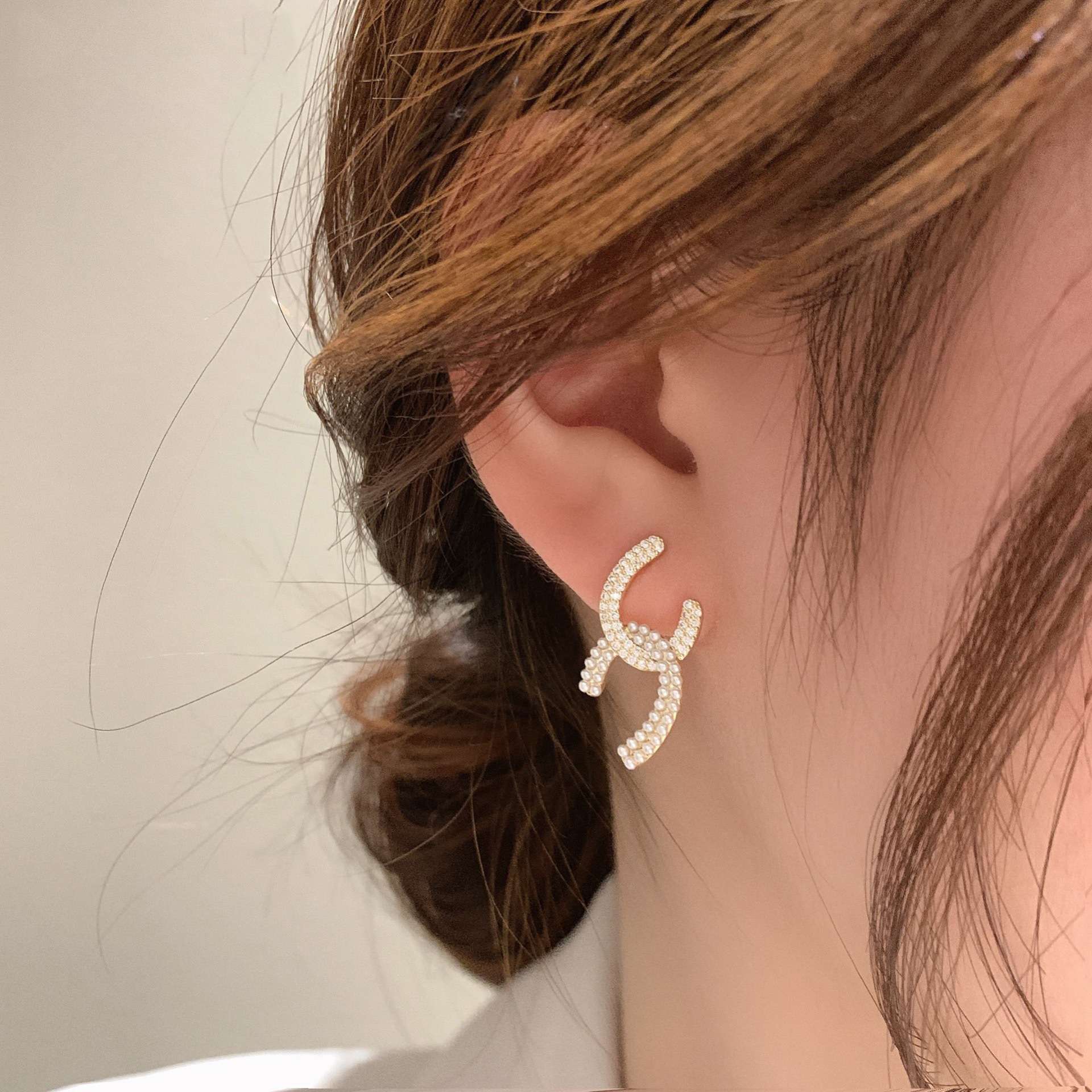 925银针日韩交叉珍珠水钻耳环 新款潮个性气质网红感大气珍珠耳钉