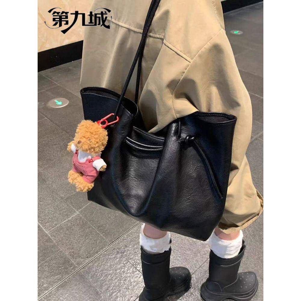 第九城复古时尚绑带托特包2026新款女包大容量学生通勤手提单肩包