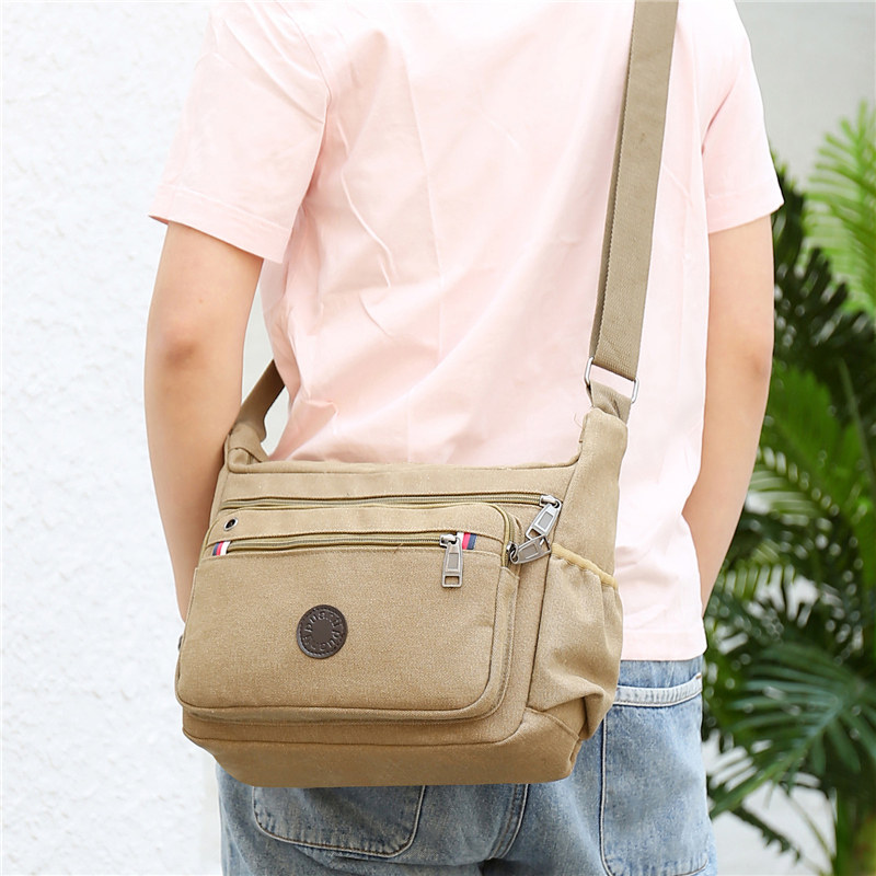 帆布包男包单肩包斜挎包休闲男包大容量挎包男士包包多功能背包,箱包皮具/热销女包/男包,男士包袋,淘宝优惠券,粉丝福利购,淘宝优惠卷
