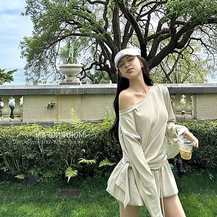 淡人感慵懒休闲侧打结斜肩上衣+花苞蓬蓬短裙半身裙女春