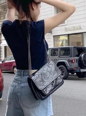 杨树林包包女2026新款油蜡牛皮菱格链条niki流浪包单肩斜挎邮差包