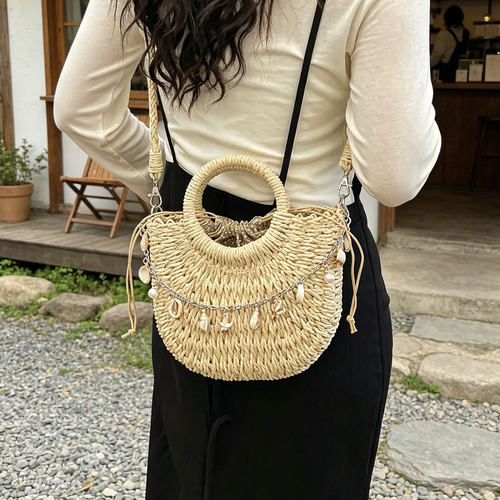 夏天手工编织水桶包女2026新款度假风沙滩包精致通勤单肩斜挎包