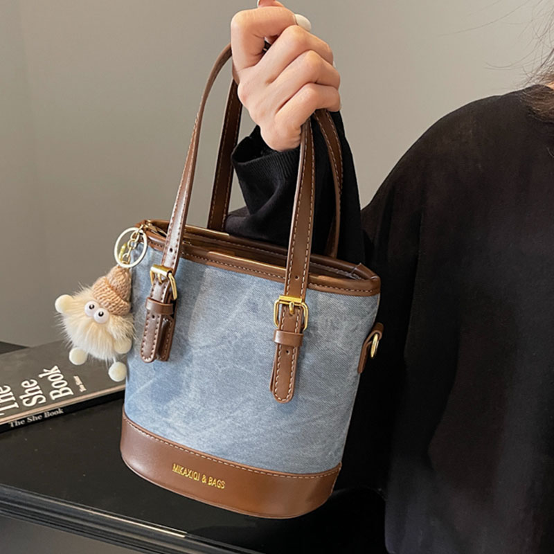 2060复古时尚休闲水桶包