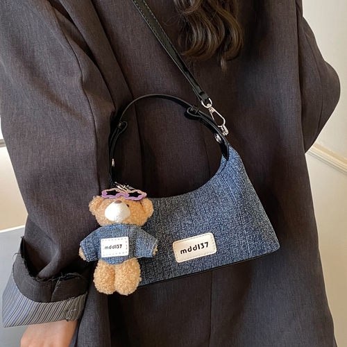 韩国复古牛仔饺子包女2025新款休闲手提便当包日常通勤单肩斜挎包