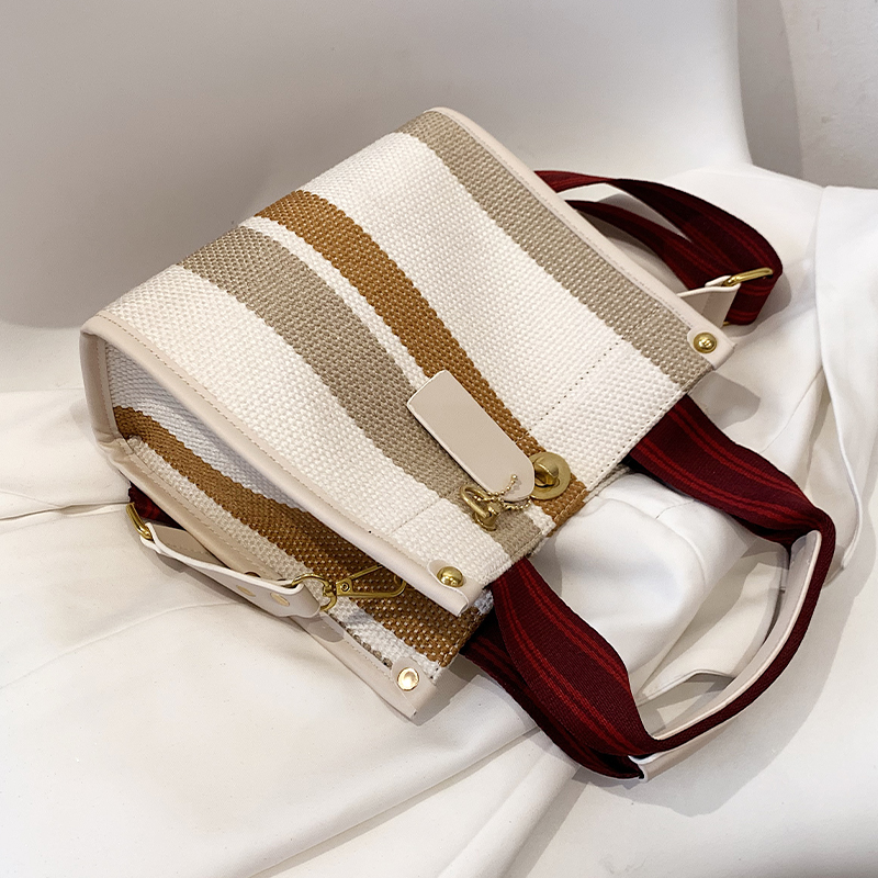 包包女夏季新款潮时尚风帆布包包