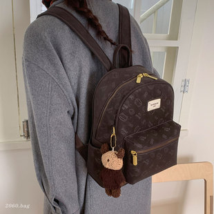 韩系复古学院风双肩包2025新款 女百搭日系小众卡通通勤大学生书包