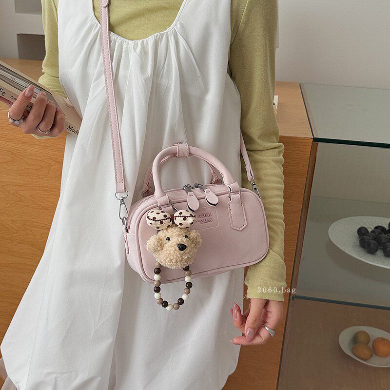 韩版高级感时尚手提保龄球包包女2026春季新款简约百搭斜挎小方包