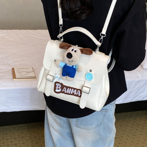 韩版可爱卡通小狗双肩包女2026夏季新款学院风通勤上课超火剑桥包